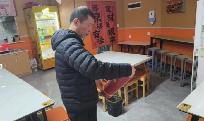 长运物业：开展商户安全检查活动